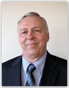 DENNIS ROMANYK